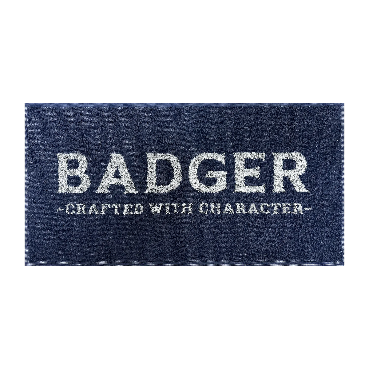 Navy Badger bar towel printed with the Badger Brewery wordmark and Crafted with Character strapline