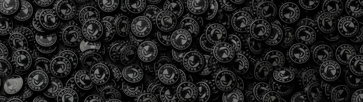 Close-up of black bottle caps filling the frame