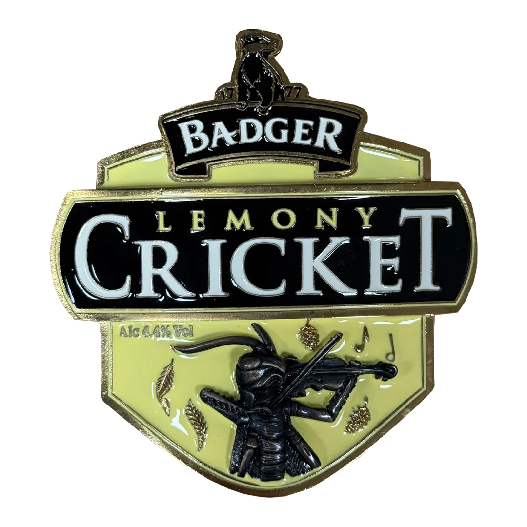 Badger Lemony Cricket pewter pump clip with cricket artwork on a pale green background