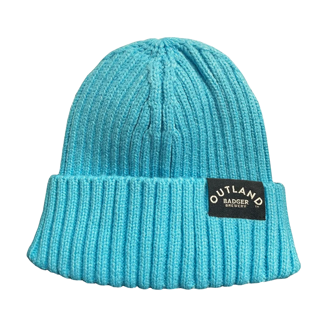 Bright turquoise ribbed Outland beanie hat with a woven Outland label