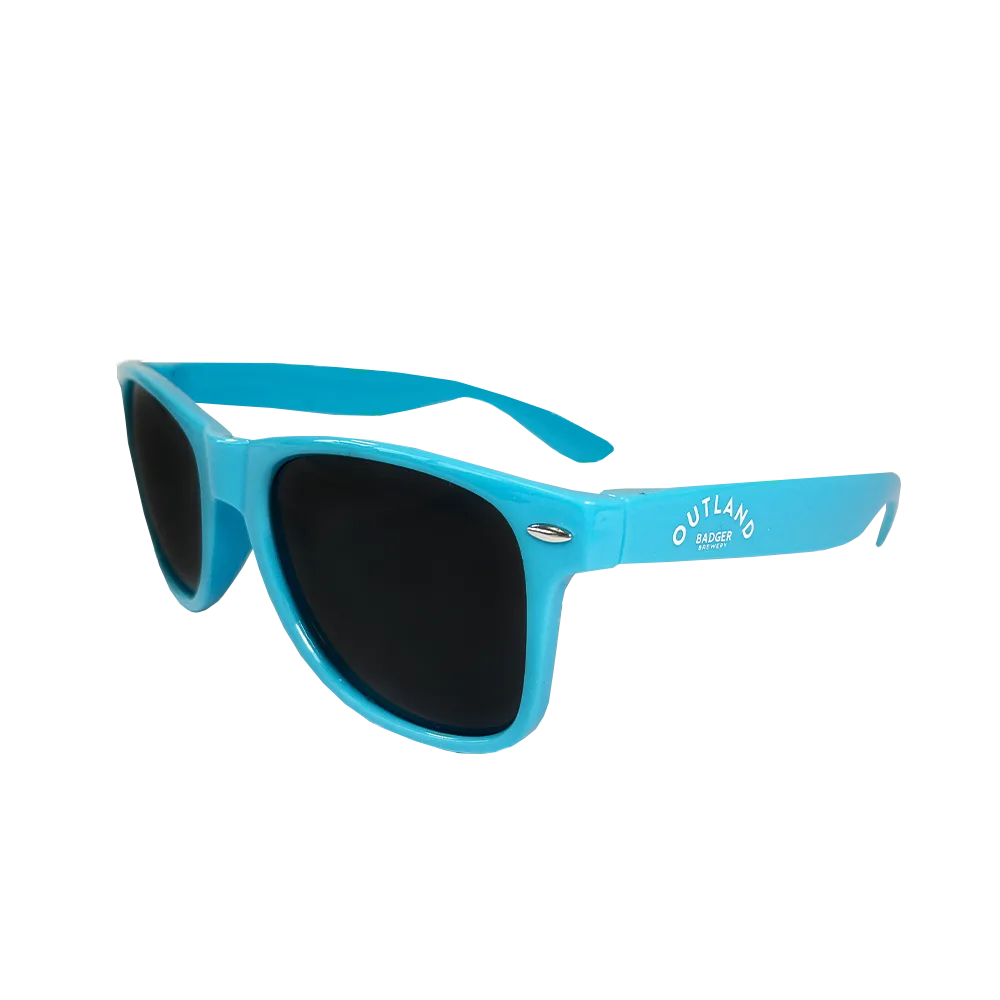 Bright blue Outland sunglasses with dark lenses, side view