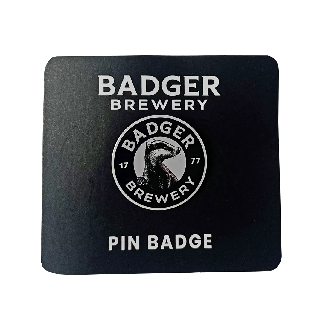 Badger Brewery pin badge on its branded backing card