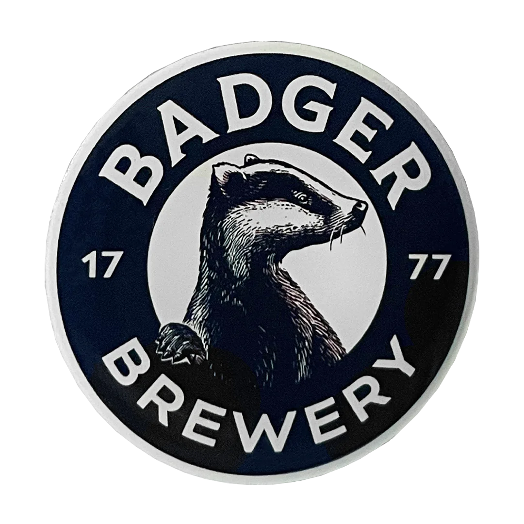 Round Badger Brewery pin badge with the badger and 1777 roundel design in navy and white