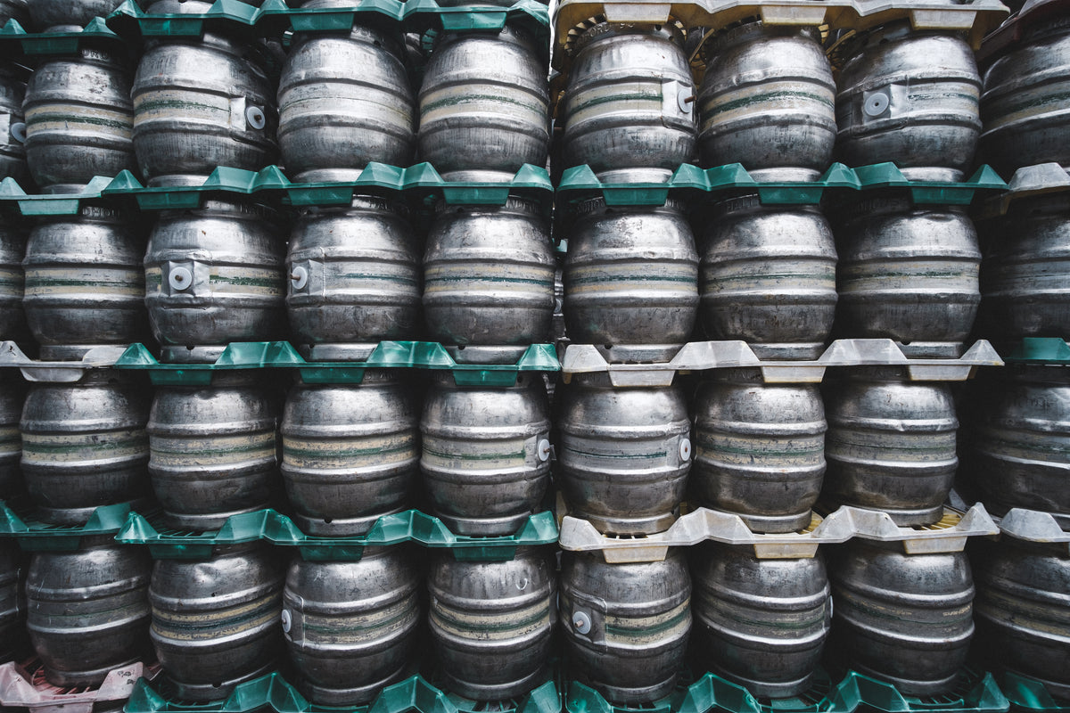 Rows of Badger Brewery silver casks stacked on top of one another outside the Badger Brewery 