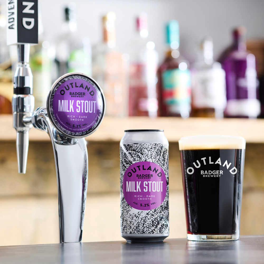 Outland Milk Stout on draught, can and pint glass of liquid