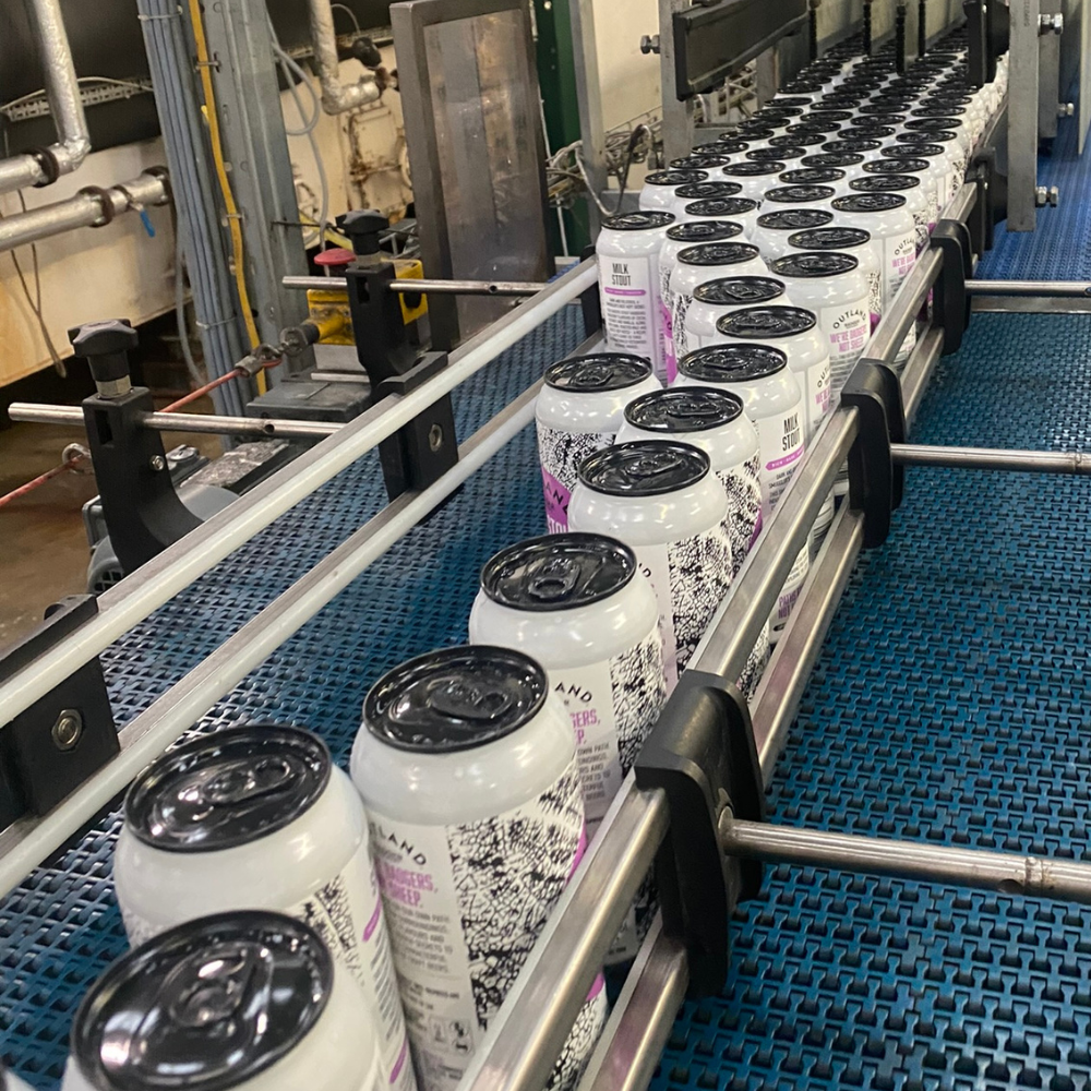 Outland Milk Stout going doing canning line