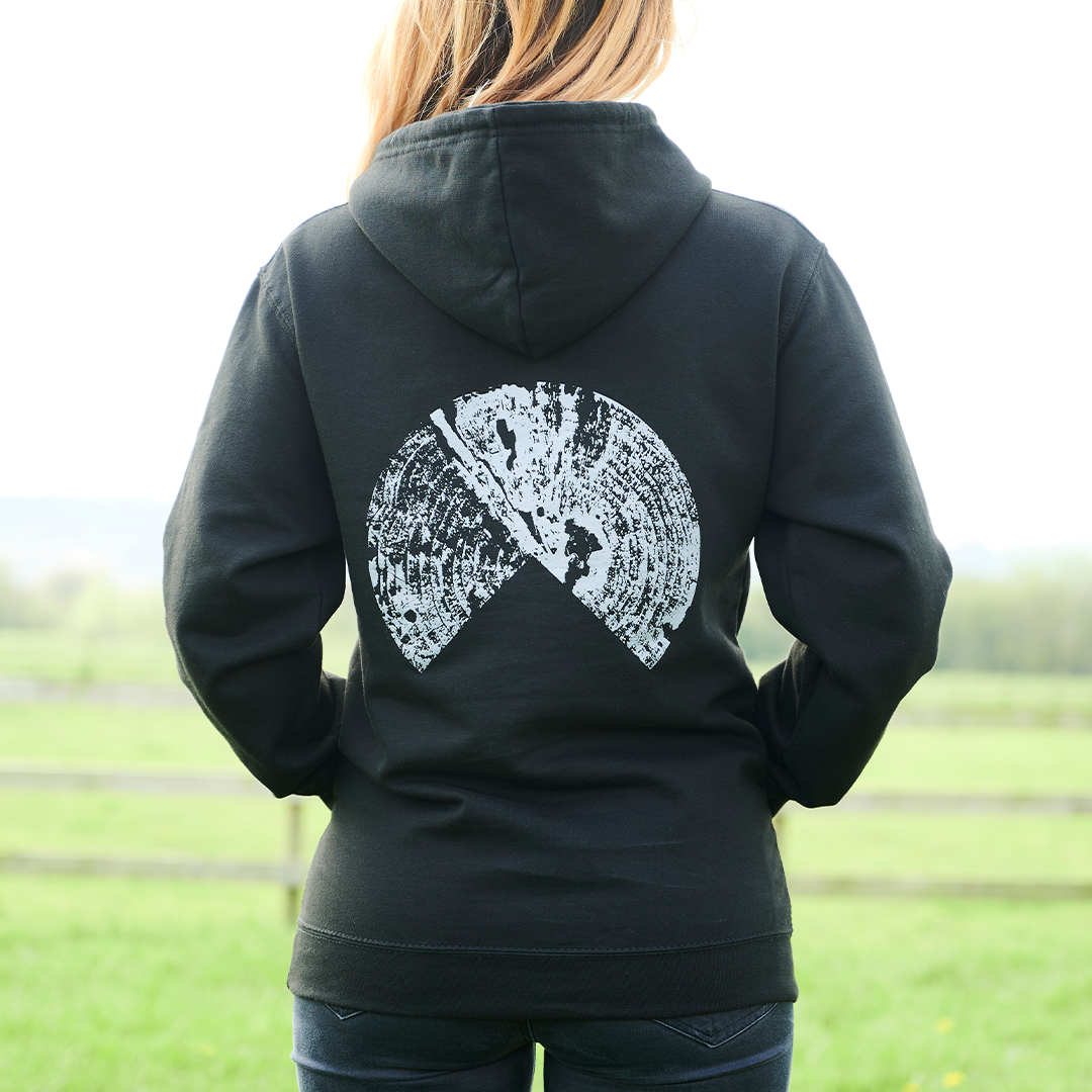 Person wearing Outland Black Hoodie (Back)