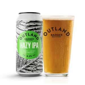 Can and pint of Outland Hazy IPA