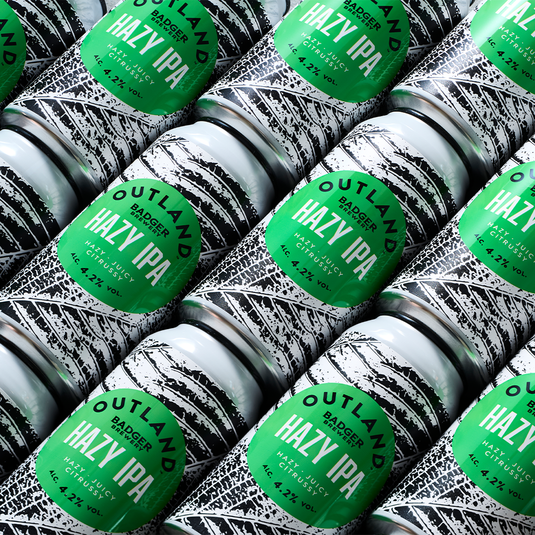 Outland Hazy IPA cans lying down