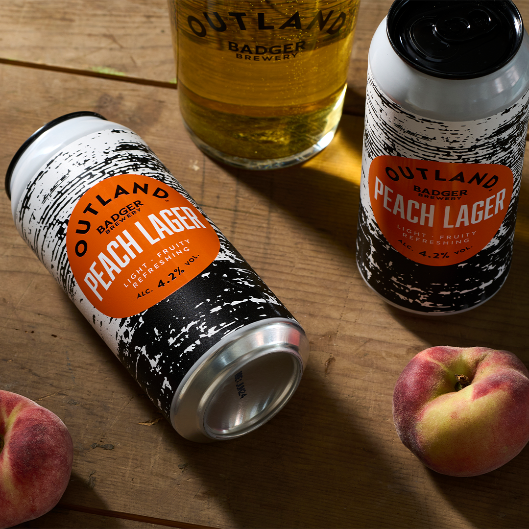 Outland by Badger Brewery Peach Lager can and pint with peaches